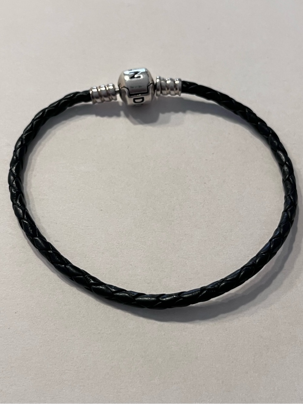 Pandora Black Braided Leather Bracelet with Silver Charm Clasp
Strong clasp